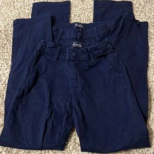 Two pairs of girls uniform pants